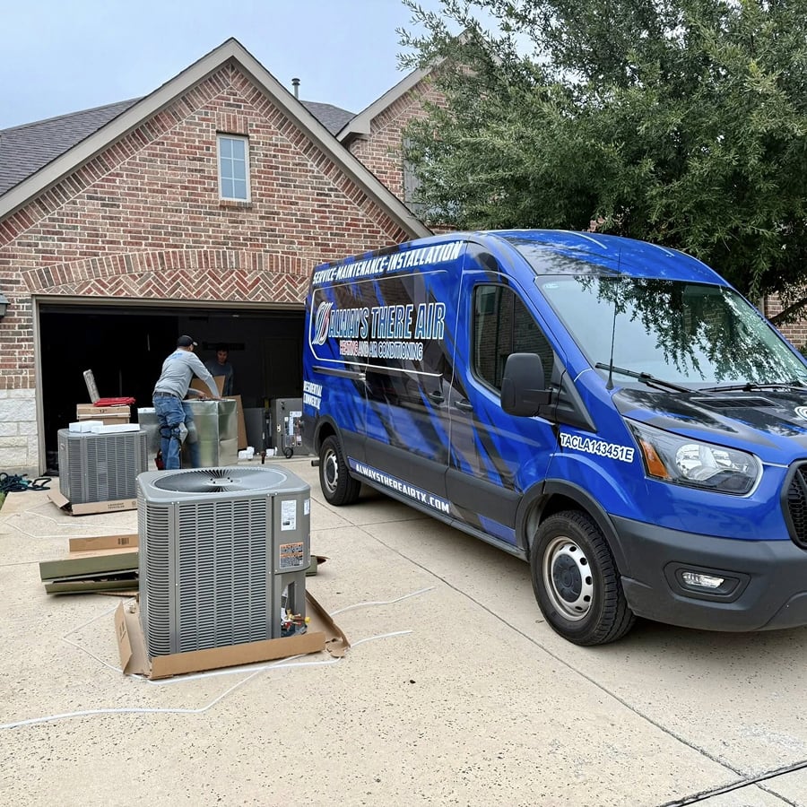 Always There Air technician servicing an outdoor AC unit next to a branded service van in a residential driveway.